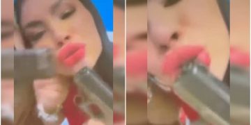 Blogueira beija arma e dança funk com namorada de traficante em festa